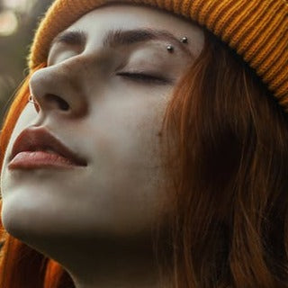 BODY PIERCING AFTERCARE  (ABOVE THE NECK)